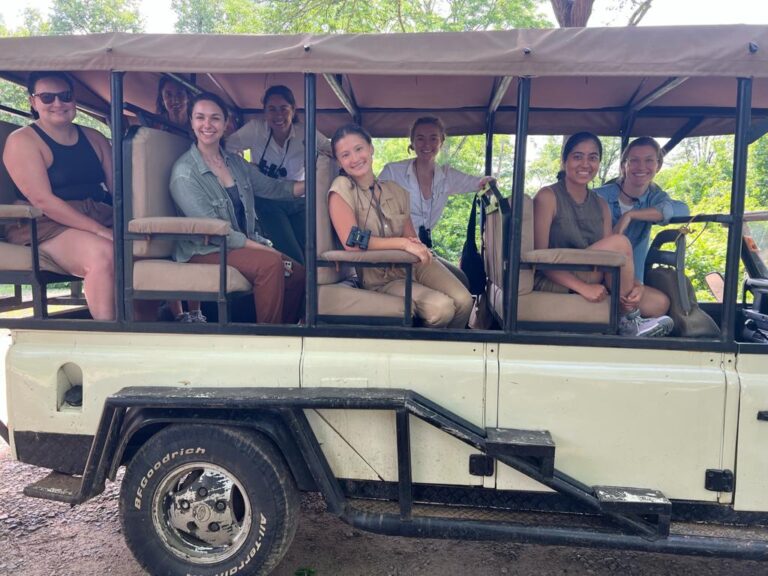 People going on a safari in a safari truck
