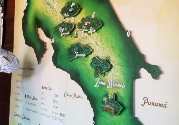 A green map of Costa Rica in a museum